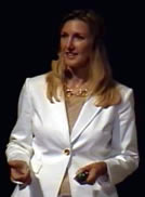 Laura Hansen speaking on stage